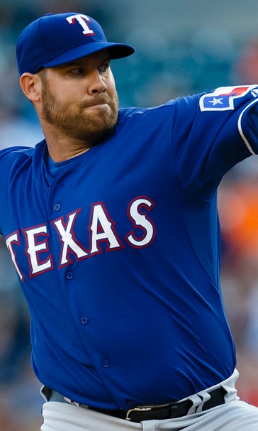 Lewis leads Rangers to win in Detroit